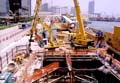 Installation of waling and strut for open cut tunnel